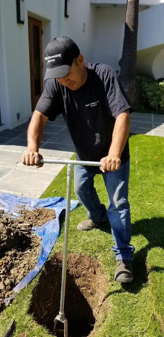 SoCal Digging crew member performing hand-excavation test pit